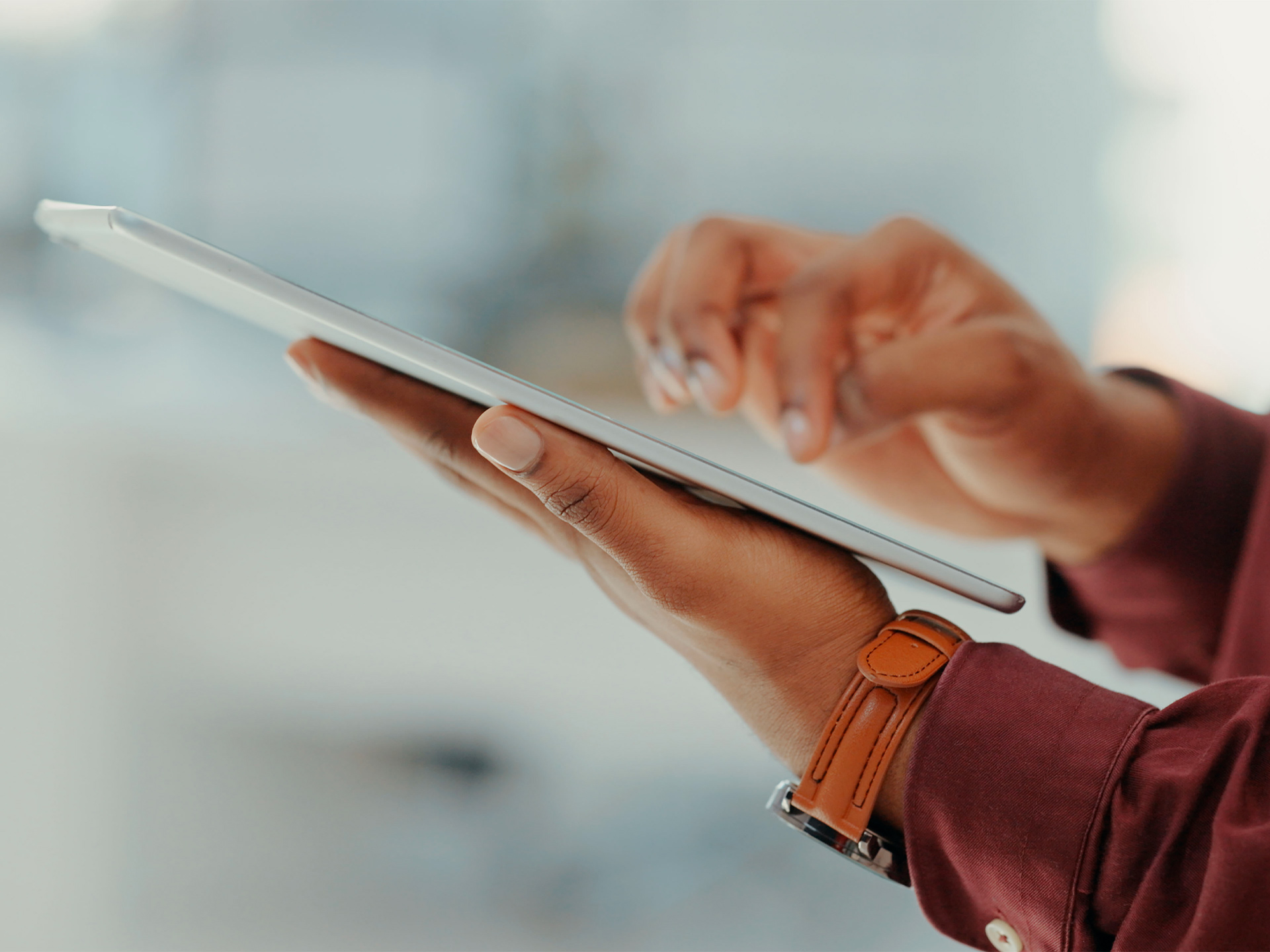 person interacting with tablet touchscreen in digital environment