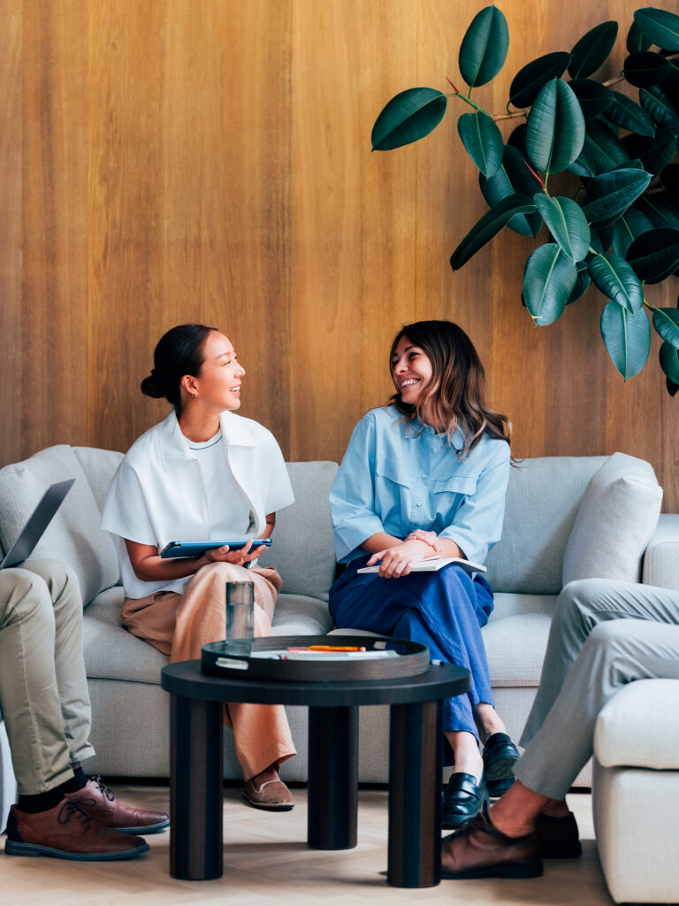 team members collaborating in a modern office meeting space
